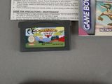 a game card and a game case sitting on a table
