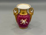 vase violet et doré avec un cheval sur le couvercle
