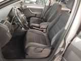 the interior of a car with two seats and a steering wheel