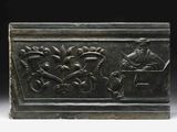 an image of a bronze box with a man and a woman on it