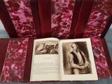 an open book with a picture of a man in a suit and tie