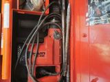 a red tool box with tools inside of it