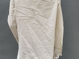 the back of a mannequin wearing a white shirt and black pants