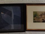 two framed pictures on the wall next to each other