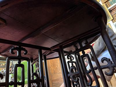 a close up view of a table with ironwork on it