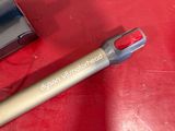a pen that is sitting on a red table