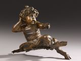 an image of a bronze statue of a child on a tree stump