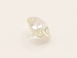 a single white diamond on a white surface