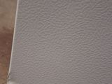 an image of a piece of white paper with holes in it