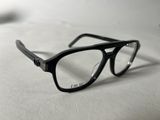 glasses on a table with a white surface and a white background