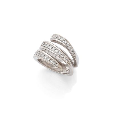 an 18k white gold and diamond ring, by van cleef