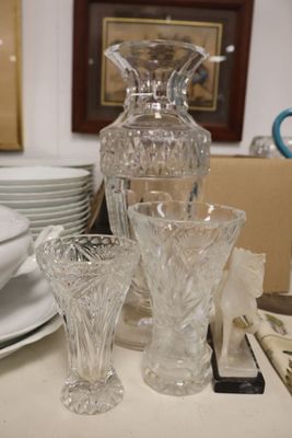a lot of glass items sitting on a table