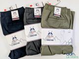 three pairs of men ' s casual pants with labels on them