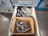 a box full of wires and wires sitting in a drawer