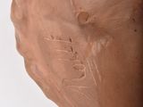 a sculpture of a horse with a heart on it ' s back