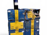 a wine bottle sitting on top of a stack of boxes