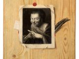 an old photo of a man with a feather in a wooden frame