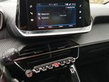 a car dashboard with a digital display in the center