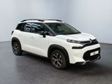 a white citrole is parked in a white room