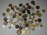 a lot of coins that are on the table