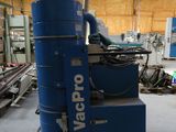 a blue machine that is sitting inside of a building
