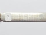 a small silver knife with a coin on the side of it