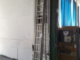 a ladder leaning up against a wall in a building