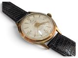 an image of a watch on a white surface