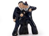 a figurine of two men standing next to each other