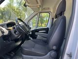a view of the inside of a van from the driver ' s seat