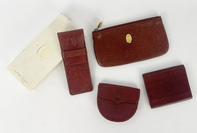 several pieces of leather are laid out on a white surface