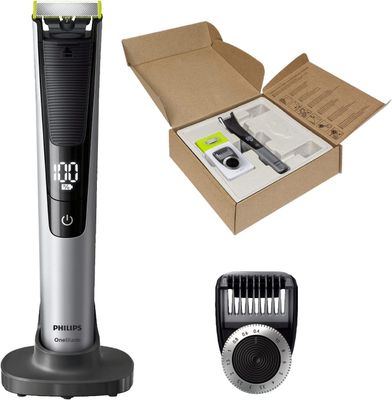 a silver and black electric shaver and a box of hair clippers