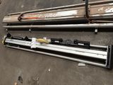 two different types of tools sitting on the ground