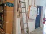 a ladder leaning against a wall in a room