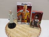 a small figurine of a man standing next to a box of cigarettes