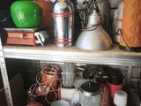 a shelf full of various items in a room