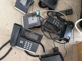 a lot of telephones that are on the floor