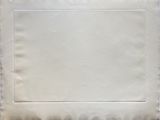 an empty piece of paper sitting on top of a table