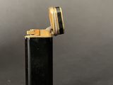 an image of a lighter that is sitting on top of a table