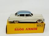 a toy car that is sitting on top of a box