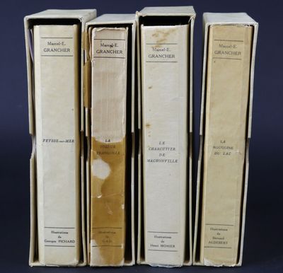 three books are stacked on top of each other on a table
