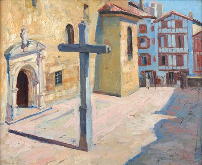 a painting of a cross on the street in front of a building