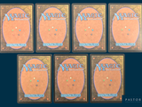four decks of magic the gathering cards are shown on a blue background