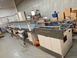 une image représentant une machine en fonctionnement dans une usine