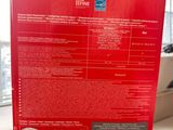 the back of a red box with a picture of a camera on it
