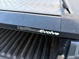 a close up of a truck with a sticker on it ' s bumper