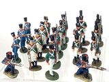 a lot of figurines that are sitting on a table