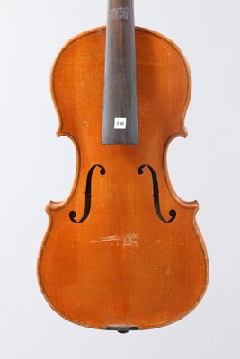 an old violin with a bow on a white background