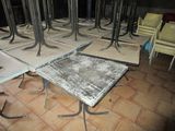many tables and chairs that have been set up in a room