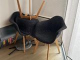 two chairs and a table in the corner of a room